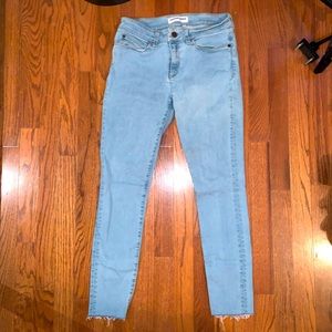 American Apparel light wash skinny jeans